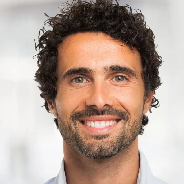 Man Smiling With Dental Implants