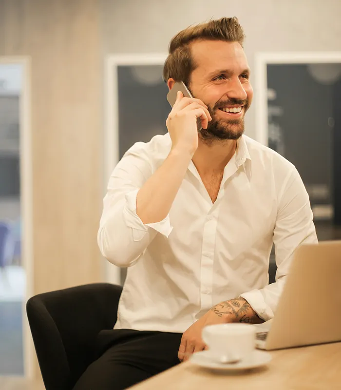Well Rested Man Having Phone Call At Office
