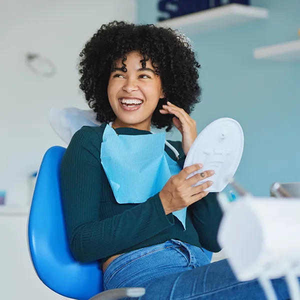 Woman Smiling After Dental Cleaning At Downtown Dental OKC