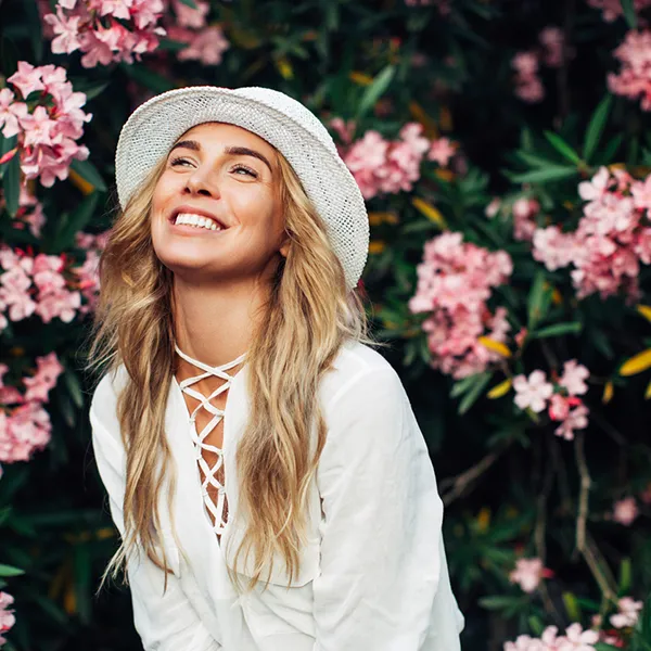 Woman Smiling Showing Off Lumineers Veneers